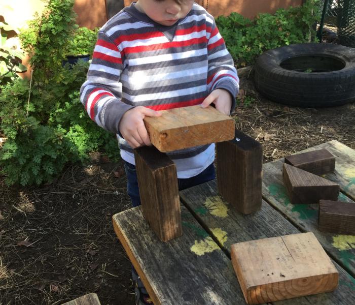 Child building with blocks