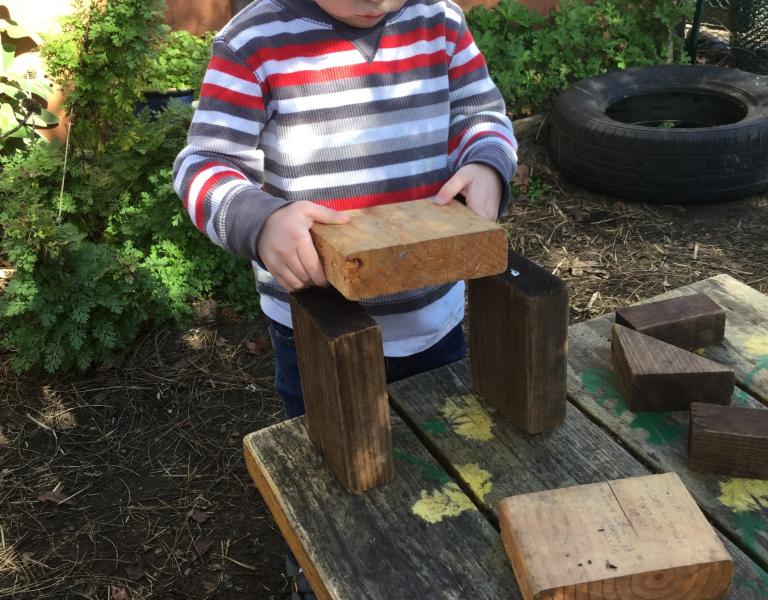 Child building with blocks